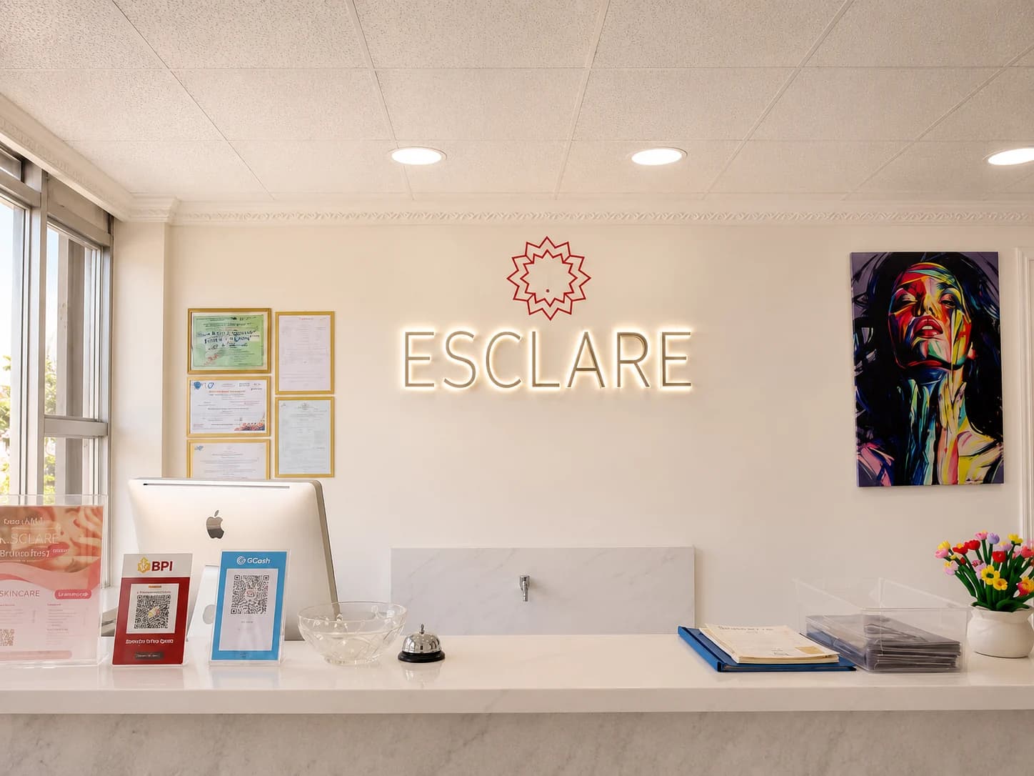 ESCLARE Daet reception with the illuminated ESCLARE wall sign