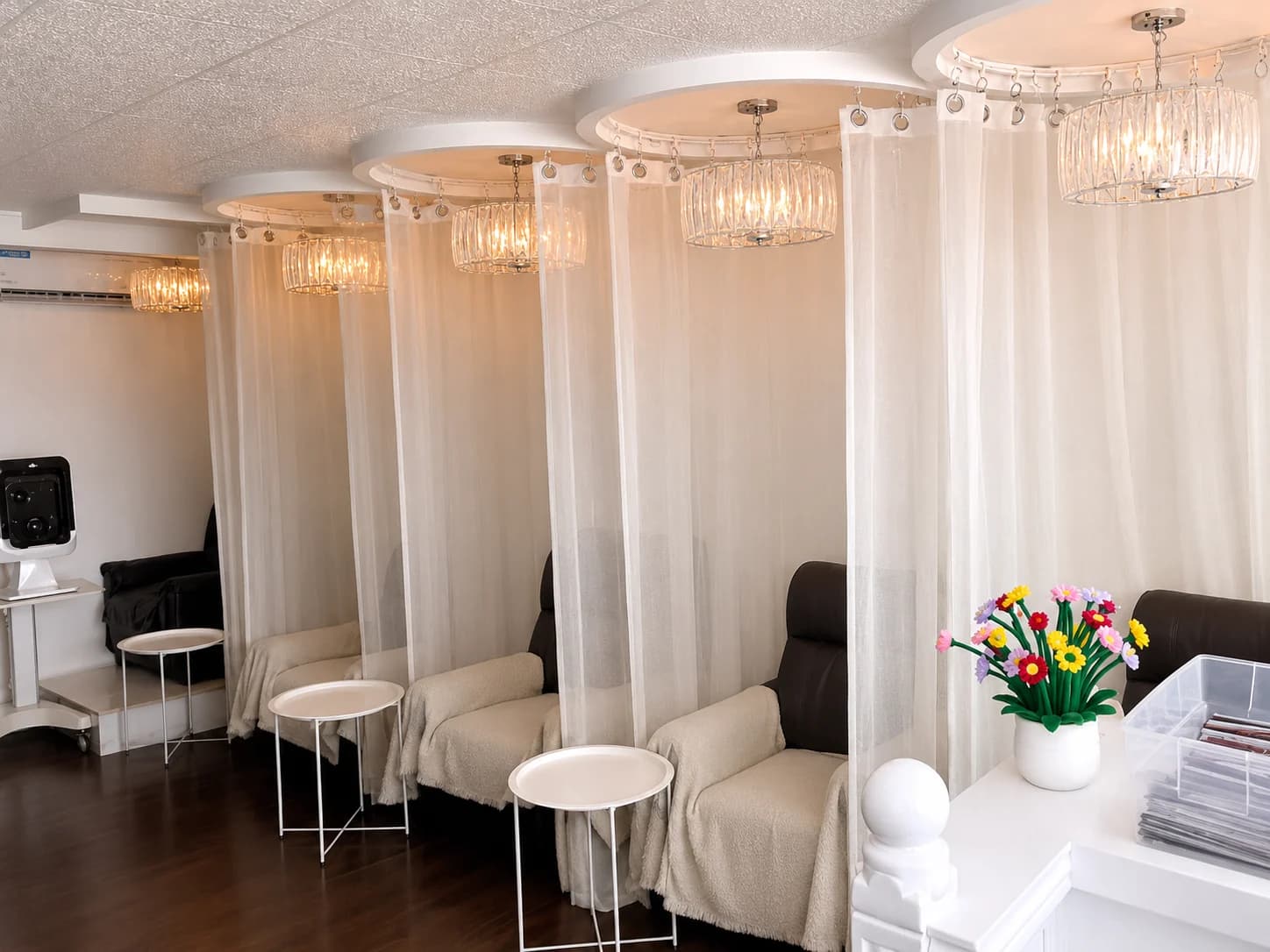 ESCLARE Daet treatment bays with privacy curtains and warm pendant lights